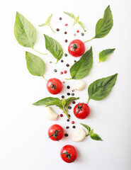 Tomato cherry, basil, spices, pepper. Fresh organic tomatoes, isolated on white.