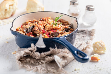 Tasty stewed cabbage and meat with beef and sauerkraut