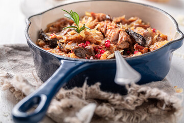 Hot stewed cabbage and meat with beef and sauerkraut