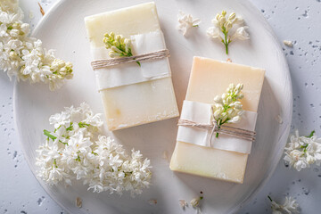 Fototapeta na wymiar Ecological lilac soap good for skin. White aromatic soap.