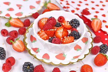 Berry yogurt bowl with strawberry, raspberry and blackberry fruits and puffed quinoa