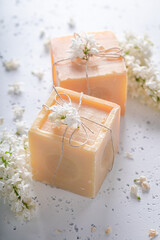 Fototapeta na wymiar Aromatic lilac soap good for skin. Lilac scent soap.