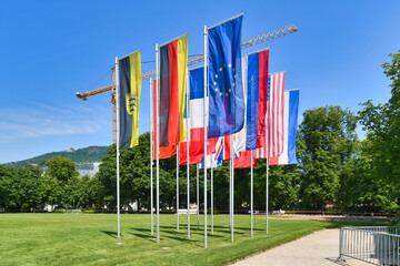 Baden-Baden, Germany -  Flags in 'Kurpark' park showing flags of Germany, EU and Baden-Württemberg...