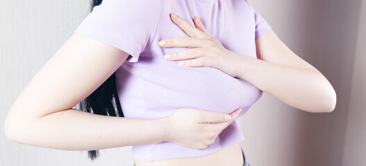 a young woman has a chest pain