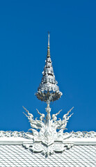 Top part decoration of famous white church in Wat Rong Khun, Chiang Rai, north of Thailand