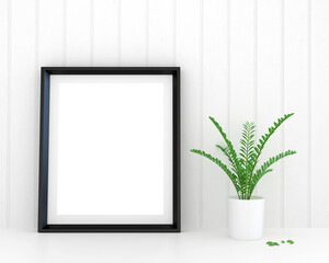 frame on the wall with plant