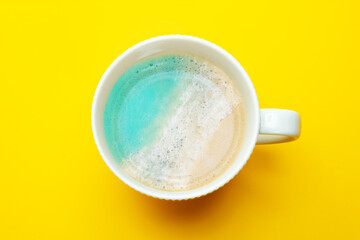 Beach and sea in the coffee mug foam concept