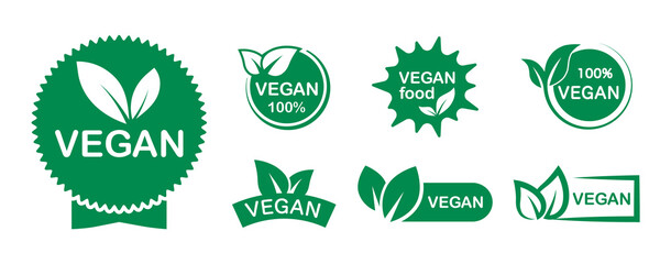 Set of vegan green icons. Vegan product 100 percent. Vegan green logo. Vegetarian food label. Collection logos and badges for healthy food. Vector illustration. - obrazy, fototapety, plakaty