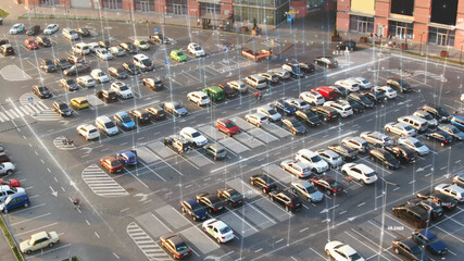 Urban city parking lot with 3D graphic holographic lines means free places. Traveling navigation...