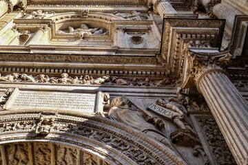 Details of the Door of Forgiveness of the Cathedral of Granada with allegories of Justice