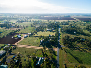 Many small properties with farm paddocks in good season showing green winter grass in Australia