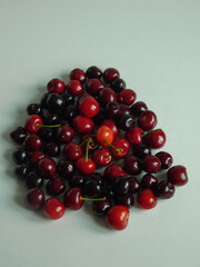 Cherry on a white background. Sweet cherry berries on a white background. Red berries are isolated.