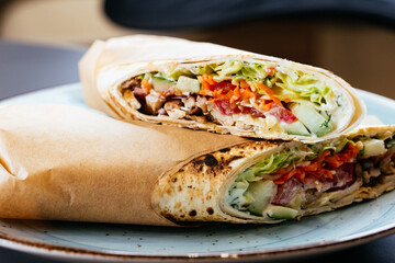 traditional Turkish shawarma in lavash with chicken and lamb