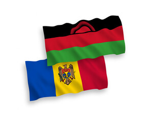 National vector fabric wave flags of Malawi and Moldova isolated on white background. 1 to 2 proportion.