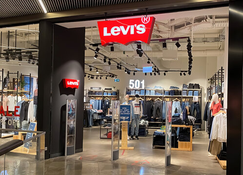 Monchengeldbach, Germany - July 24. 2021: View on store entrance with logo lettering of levis jeans in german shopping mall