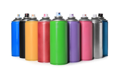 Cans of different spray paints on white background. Graffiti supplies