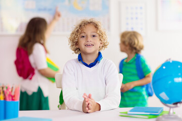 Fototapeta premium Kids in school. Children in class.