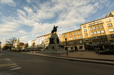 Krakow, Poland : Wide angle shot of Grunwald Monument, an equestrian statue of King of Poland located at Matejko Square against cloudy sky