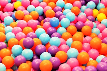 Fototapeta na wymiar Bright plastic balls for dry baby pool 