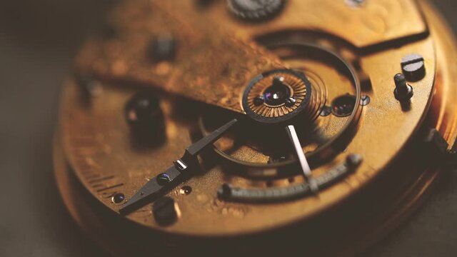 Vintage Fusee pocket watch ticking macro, keeping time.