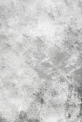 Textured grey background.