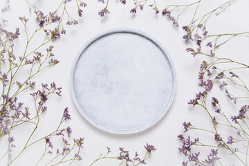 Textured white background with a flowers. Copy space.