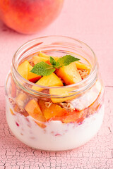 Healthy breakfast. Granola / muesli yoghurt and fruit.