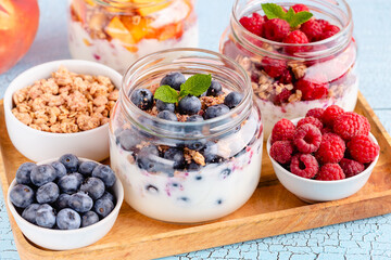 Healthy breakfast. Granola / muesli yoghurt and fruit.
