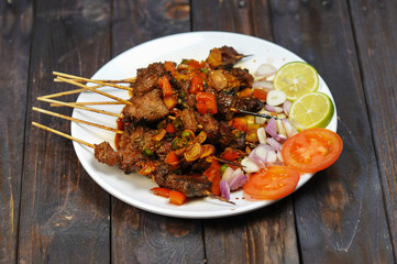 Sate Kambing or satai goat is a food made from young goat meat which is stabbed with a stick and then burned using wood charcoal.