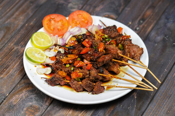 Sate Kambing or satai goat is a food made from young goat meat which is stabbed with a stick and then burned using wood charcoal.