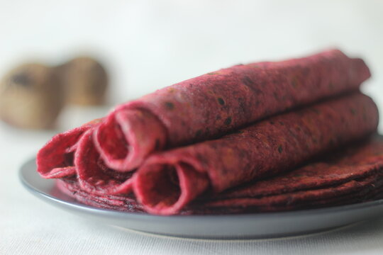 Beetroot Paratha is a Indian pan fried whole wheat flatbread made of wheat flour kneaded with fresh grated beetroot and spices.
