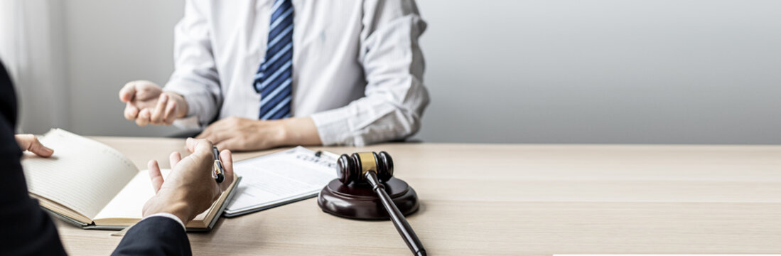 Attorneys or lawyers are advising clients in defamation cases, they are collecting evidence to bring charges against the parties for damages. The concept of defamation case counseling.