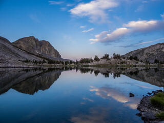Early summer morning on mountain lake