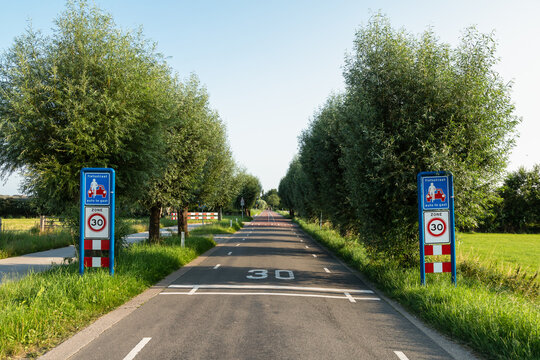 Road signs with the inscription "bicycle street - car is a guest" and 30 kilometer zone.