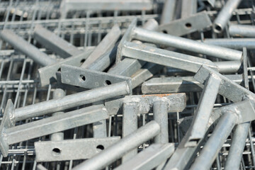 metallic fence or barrier hardware close up