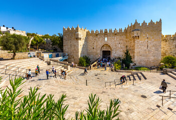 Damascus Gate of ancient Old City walls leading to bazaar marketplace of Muslim Quarter of...
