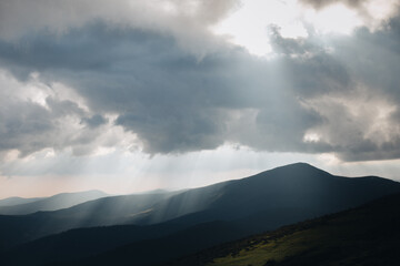 Obraz na płótnie Canvas Moody mountains Carpathians tonal perspective sunbeams sunshine nature hiking