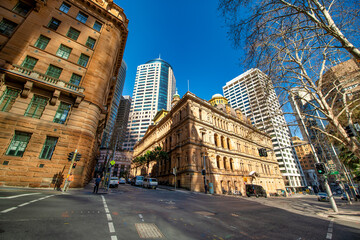 Fototapeta premium SYDNEY - AUGUST 19, 2018: Amazing Sydney skyline, skyward view from the street level.