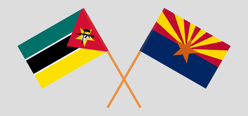 Crossed flags of Mozambique and the State of Arizona. Official colors. Correct proportion