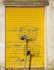 Old trashcan in yellow