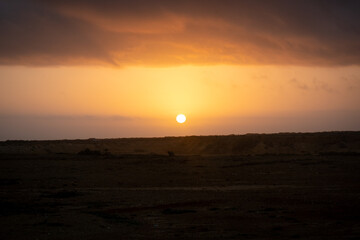 Sunrise in the Desert at Punta Gallinas, with a Yellow Sky Full of Clouds in La Guajira, Colombia