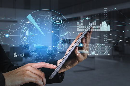 Tablet device in hands, businessman browse the Internet. HUDs with digital interface, information security and range of graphs and charts. Concept of successful manager and technologies in business