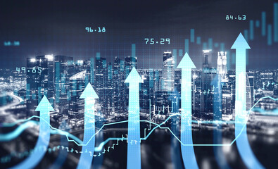 Hologram financial bar and line charts over night Singapore panoramic city view. The concept of...