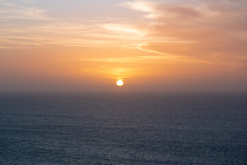 Fototapeta premium View of the Sunset, the Sea and an Orange Sky in La Guajira, Colombia