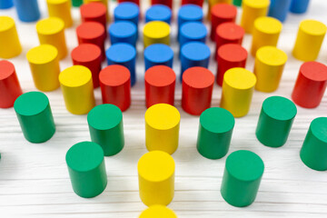 Colorful toy flower with wooden blocks for children on white table. Games for kindergarten, preschool or daycare. Education, back to school concept. Close up pattern