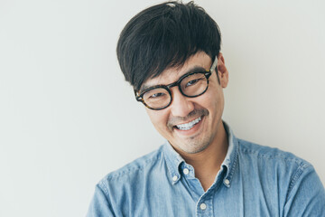 adult asian man.young male person wear eye glasses.posing smiling laughing look excited surprised thinking positive happy people.empty space for text advertising.white background.attractive fashion