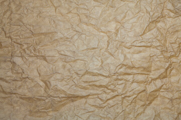 Textured brown paper background.