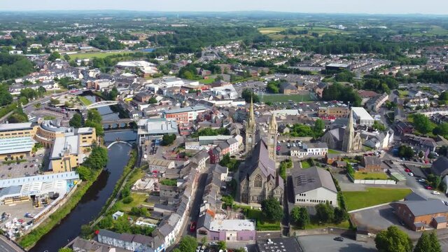Aerial video of St Columbas Church of Ireland Sacred Heart Church in Omagh Town Centre Co Tyrone Northern Ireland 