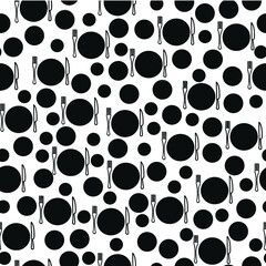 black dots on white with fork and knife