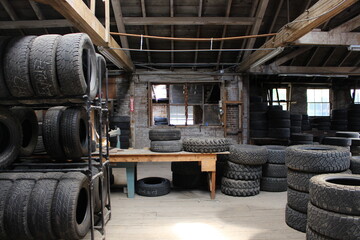 windows tires and wood in old sawmill